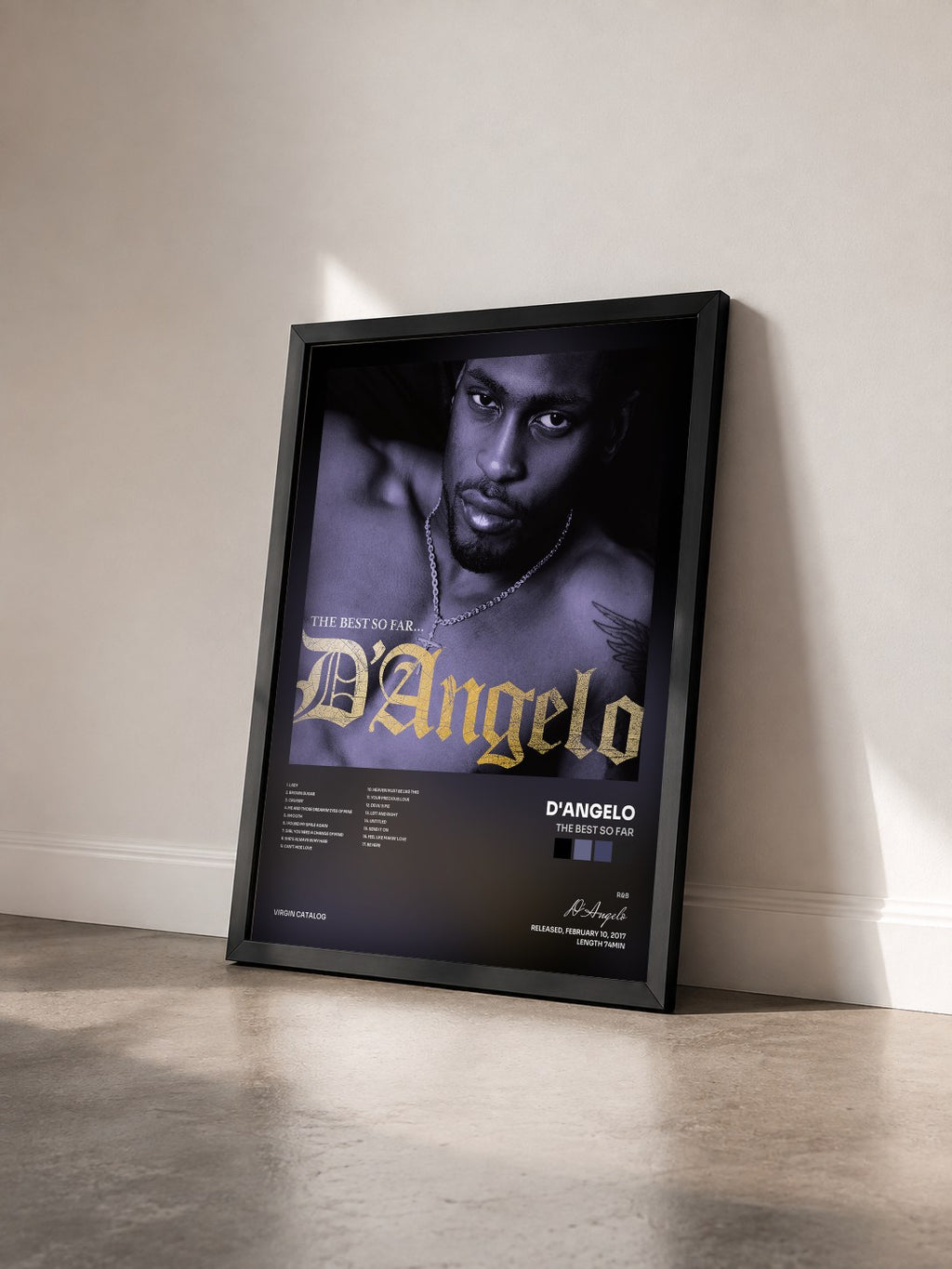 #noir Tableau de l'album The Best So Far de D'Angelo vu de trois quarts, cadre noir