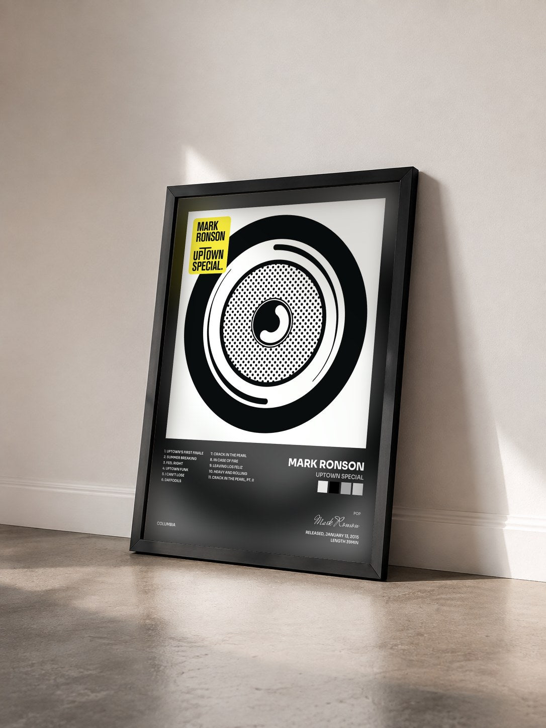 #noir Tableau de l'album Uptown Special de Mark Ronson vu de trois quarts, cadre noir