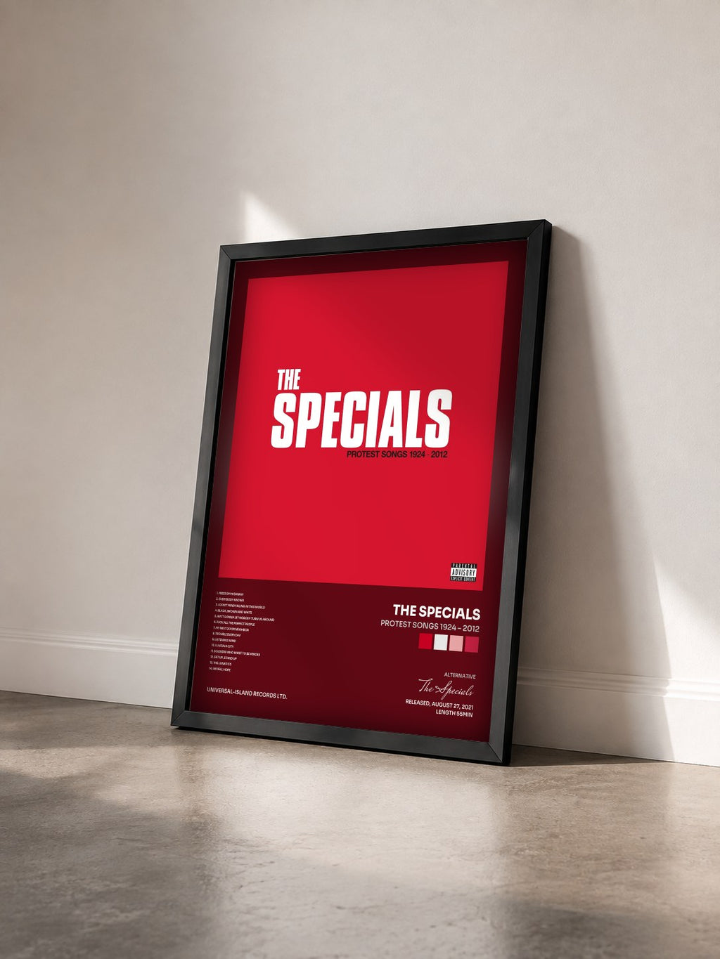 #noir Tableau de l'album Protest Songs 1924 – 2012 de The Specials vu de trois quarts, cadre noir