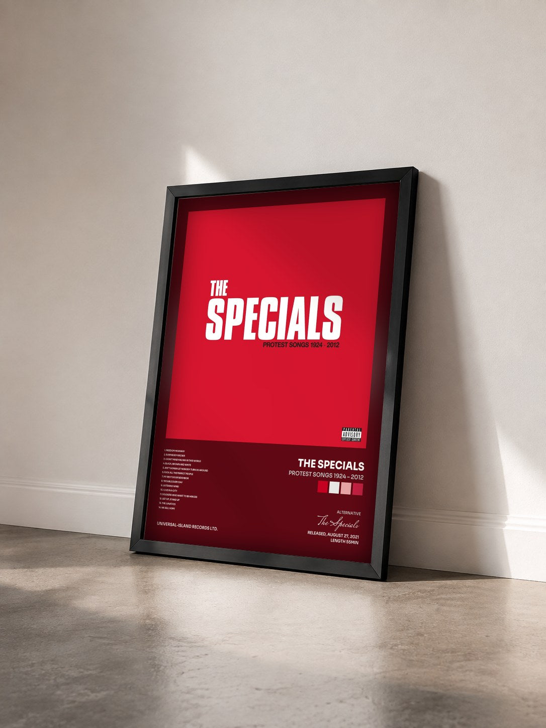 #noir Tableau de l'album Protest Songs 1924 – 2012 de The Specials vu de trois quarts, cadre noir