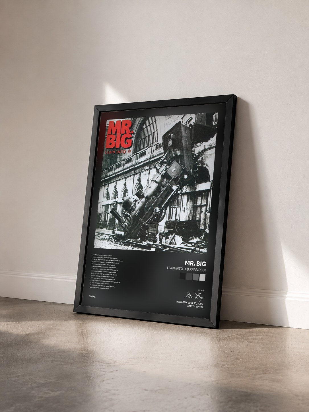 #noir Tableau de l'album Lean Into It [Expanded] de Mr. Big vu de trois quarts, cadre noir