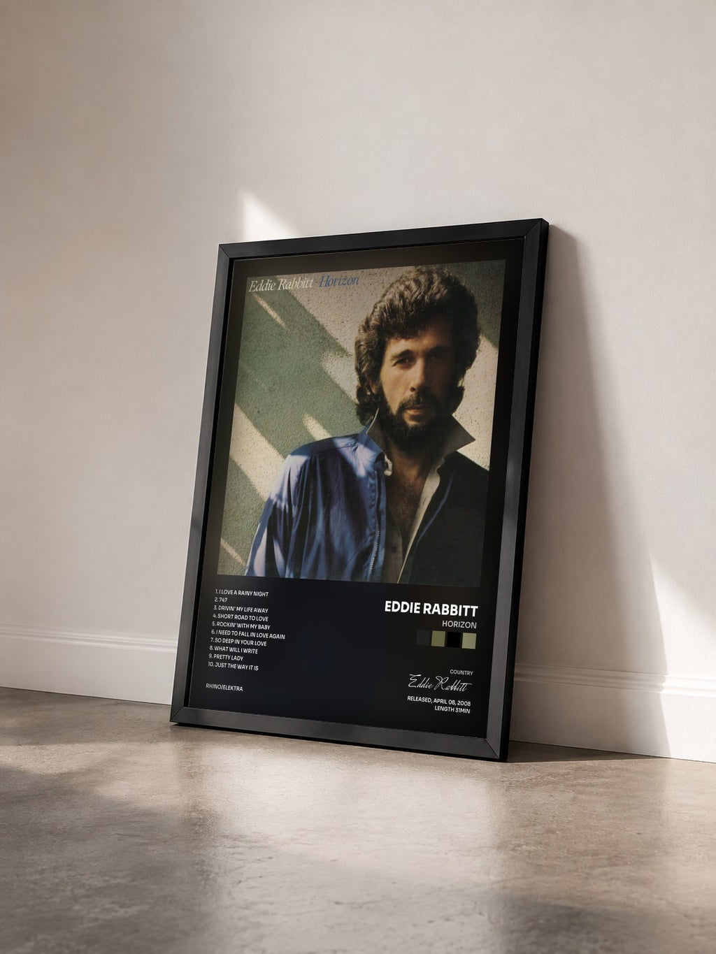 #noir Tableau de l'album Horizon de Eddie Rabbitt vu de trois quarts, cadre noir