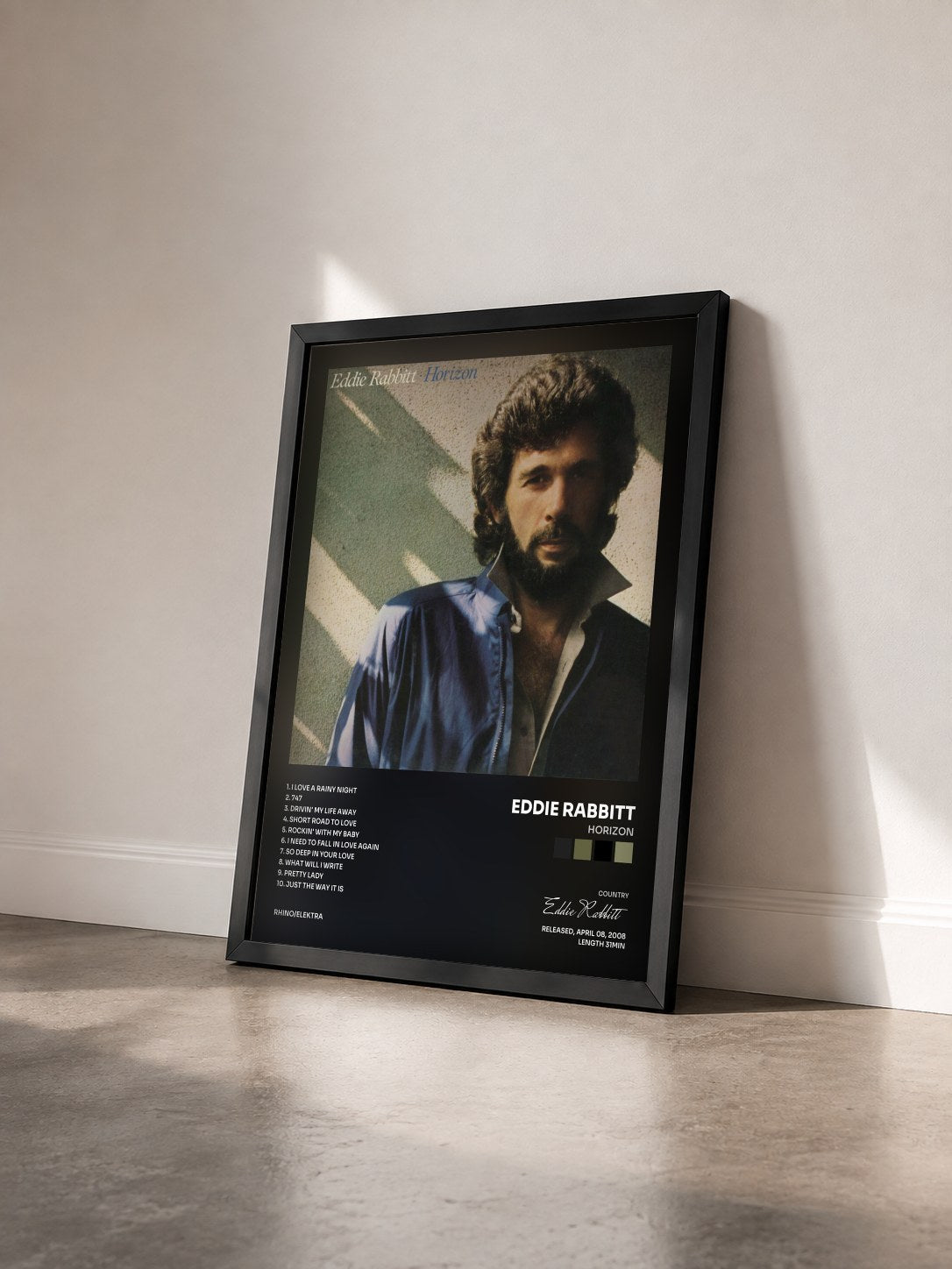 #noir Tableau de l'album Horizon de Eddie Rabbitt vu de trois quarts, cadre noir