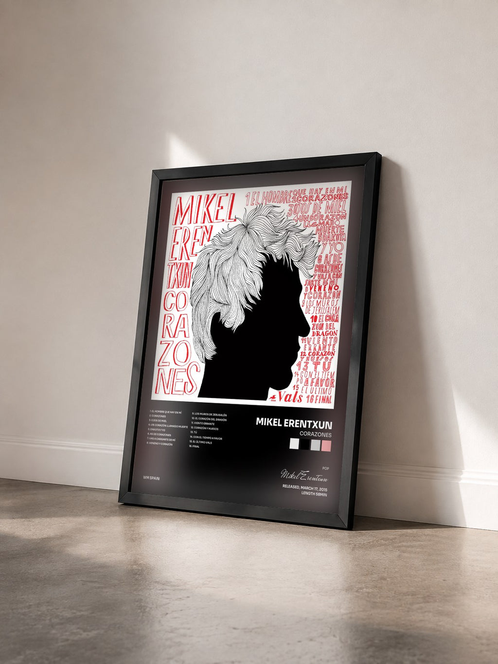 #noir Tableau de l'album Corazones de Mikel Erentxun vu de trois quarts, cadre noir