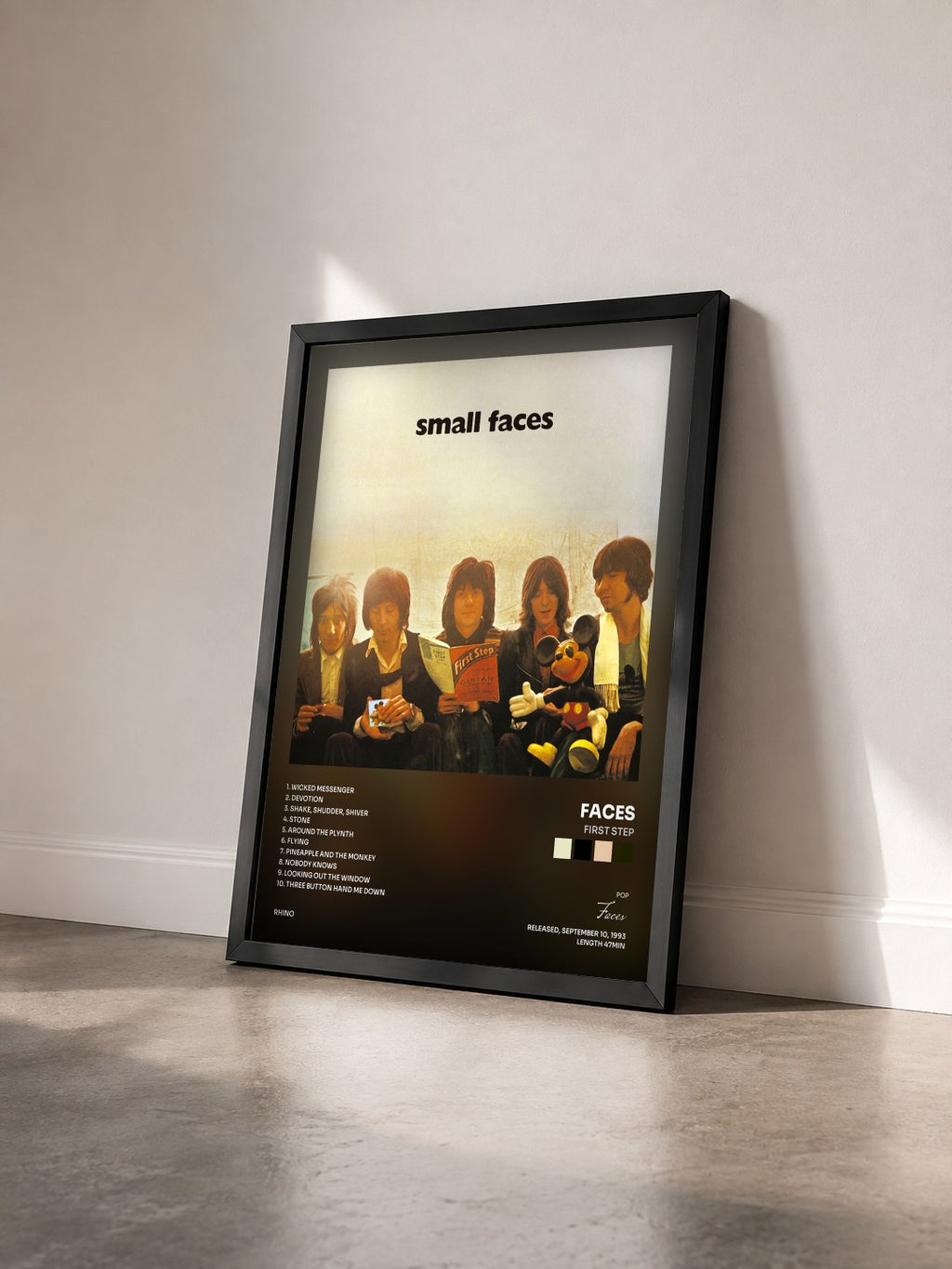 #noir Tableau de l'album First Step de Faces vu de trois quarts, cadre noir