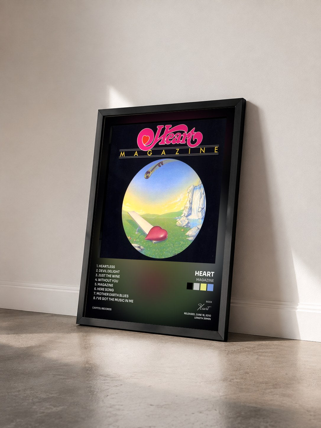 #noir Tableau de l'album Magazine de Heart vu de trois quarts, cadre noir