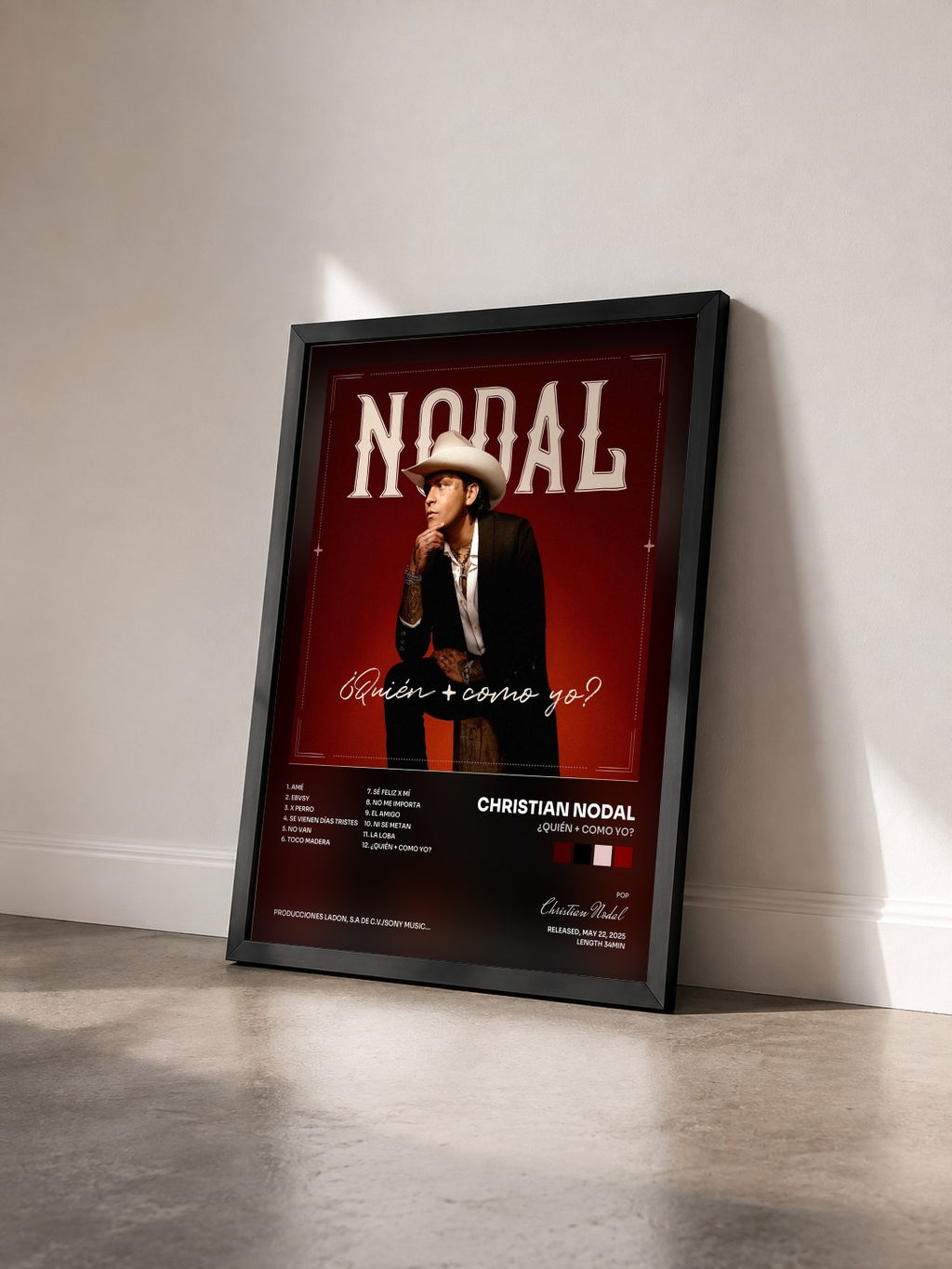#noir Tableau de l'album ¿Quién + Como Yo? de Christian Nodal vu de trois quarts, cadre noir