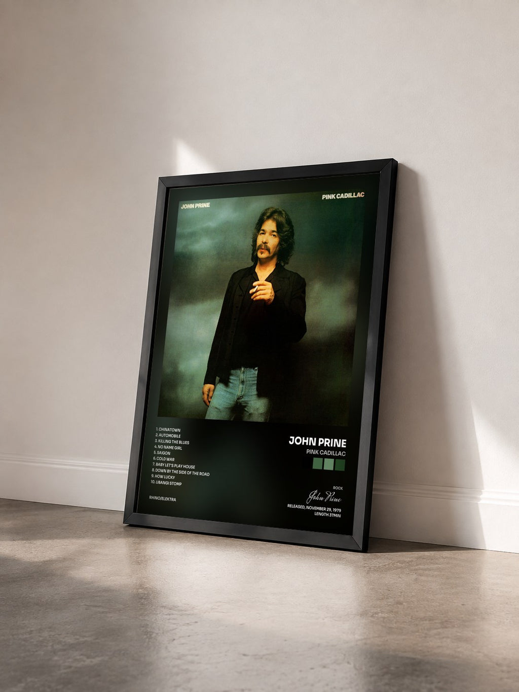 #noir Tableau de l'album Pink Cadillac de John Prine vu de trois quarts, cadre noir