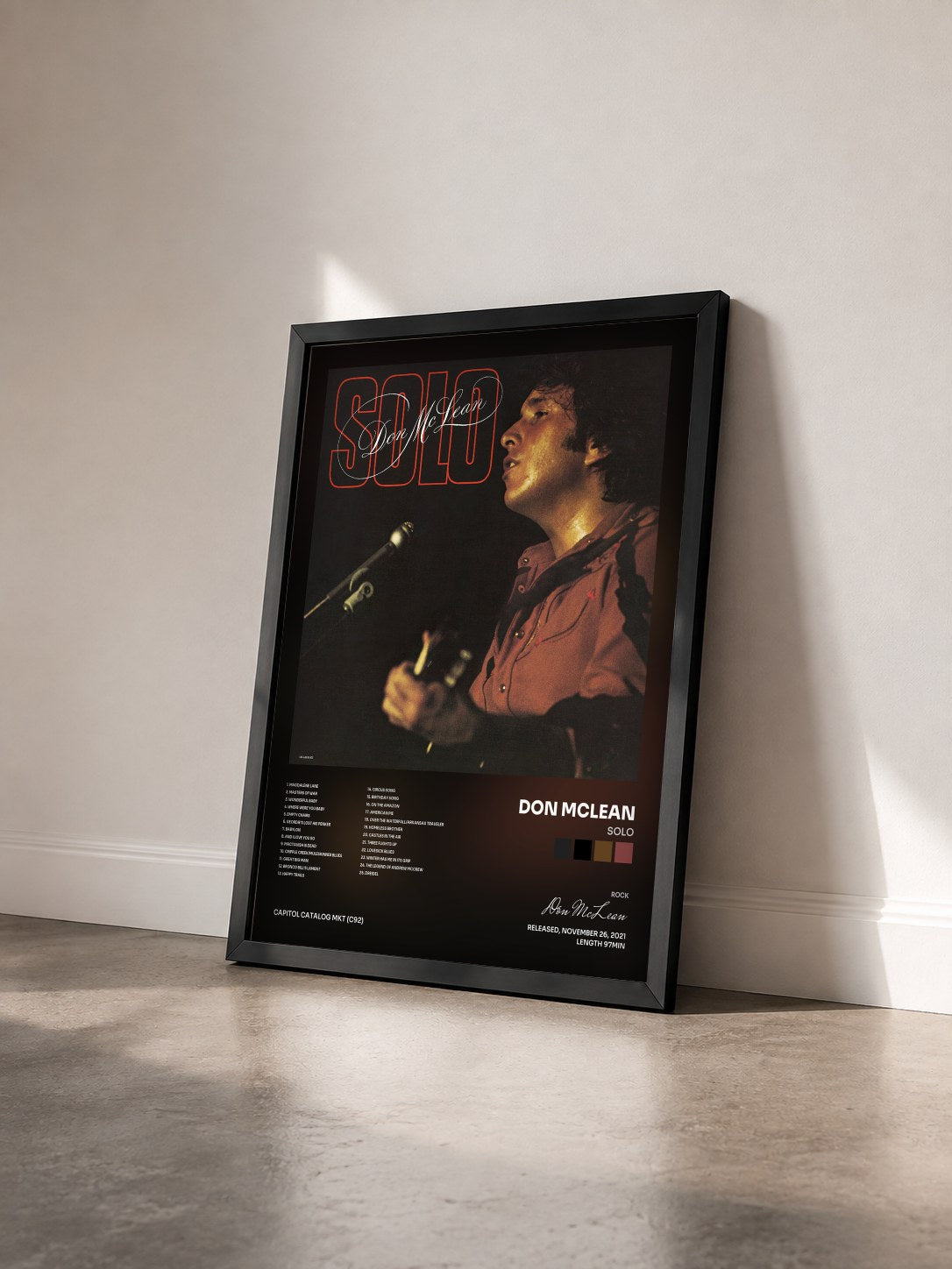 #noir Tableau de l'album Solo de Don McLean vu de trois quarts, cadre noir
