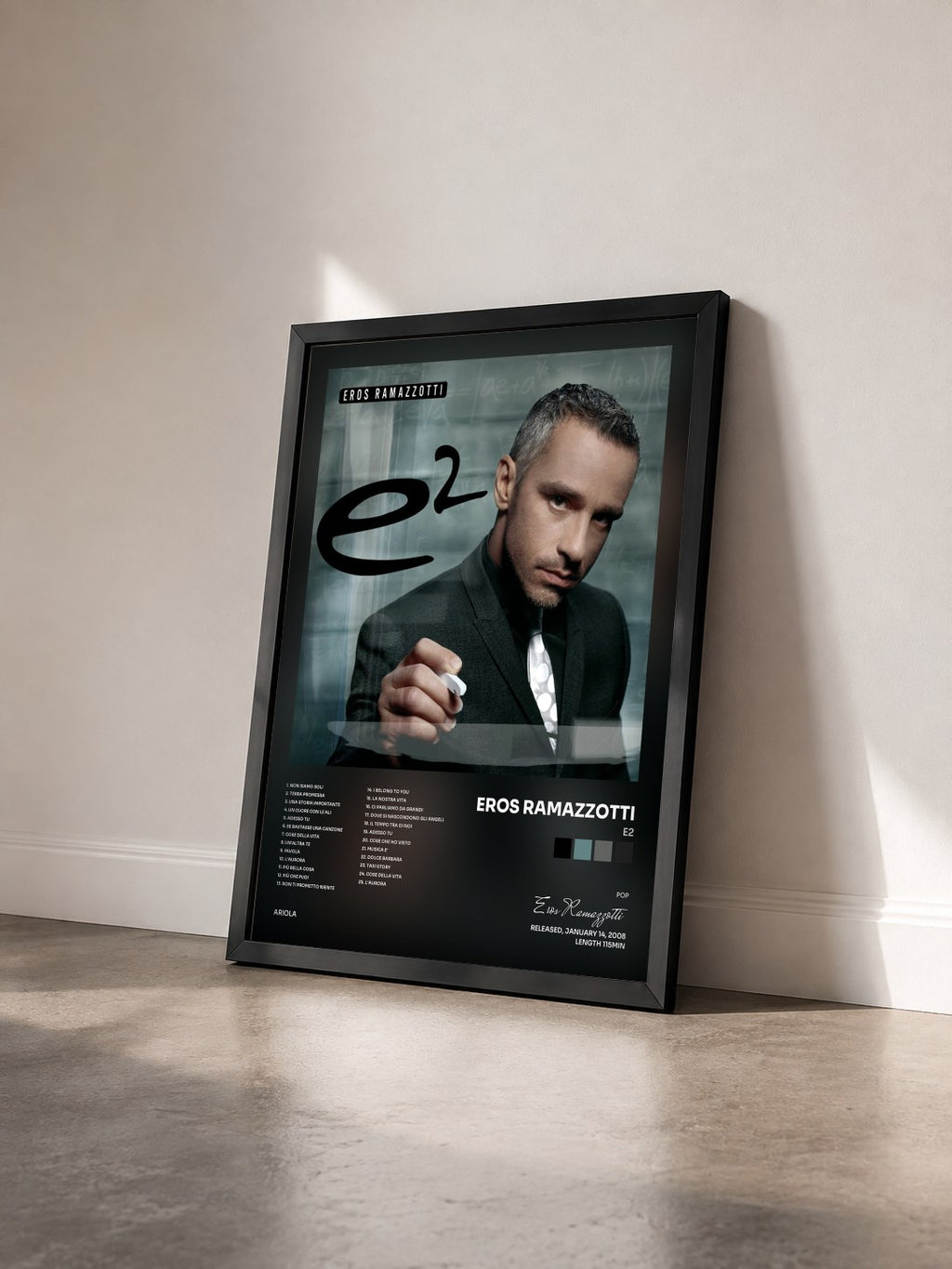 #noir Tableau de l'album E2 de Eros Ramazzotti vu de trois quarts, cadre noir