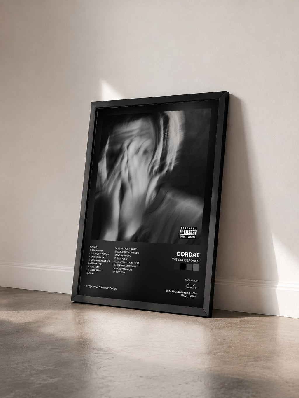#noir Tableau de l'album The Crossroads de Cordae vu de trois quarts, cadre noir