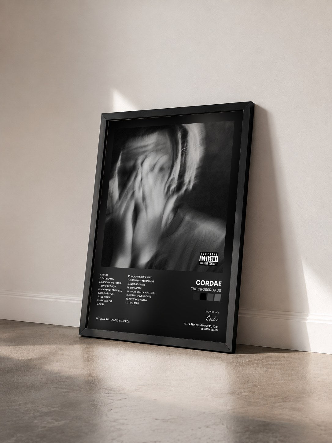 #noir Tableau de l'album The Crossroads de Cordae vu de trois quarts, cadre noir
