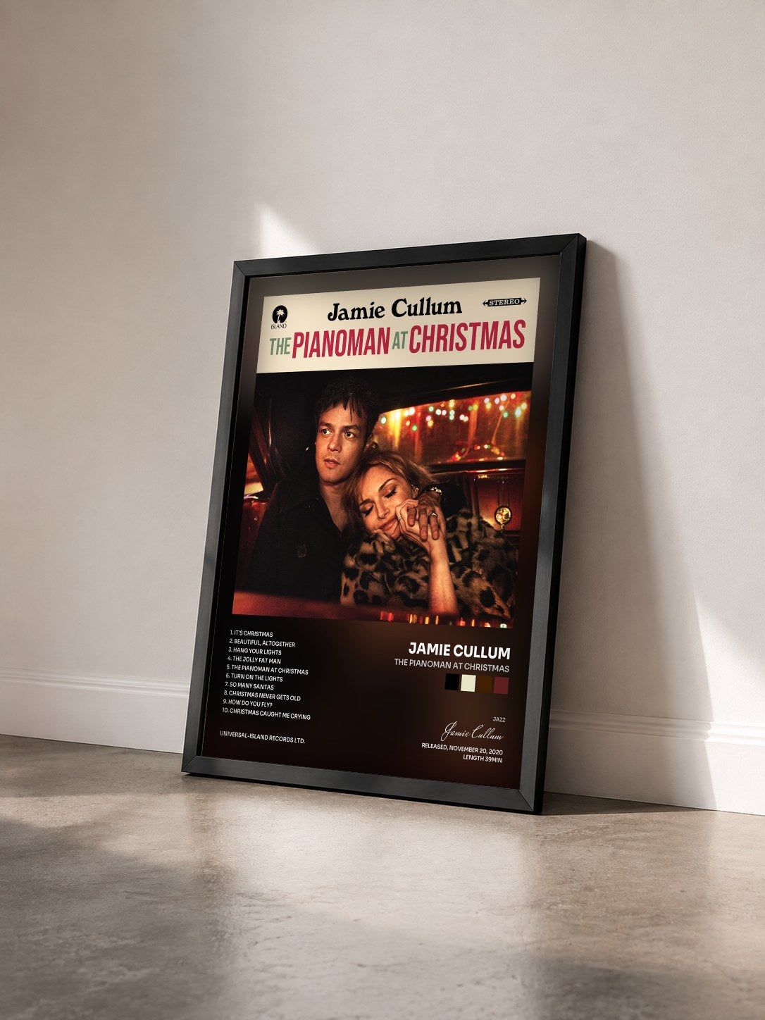 #noir Tableau de l'album The Pianoman at Christmas de Jamie Cullum vu de trois quarts, cadre noir