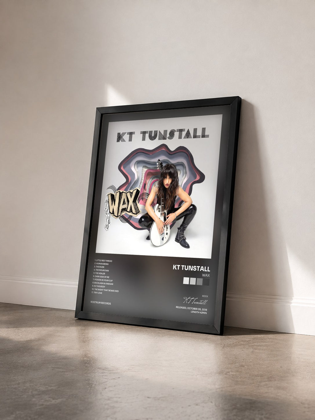 #noir Tableau de l'album WAX de KT Tunstall vu de trois quarts, cadre noir
