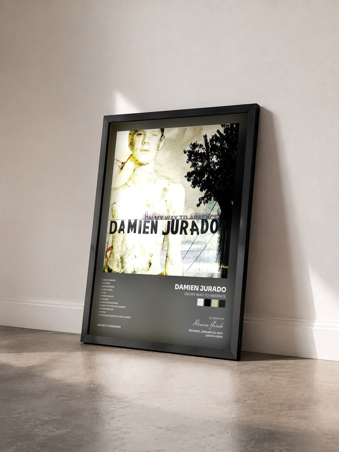 #noir Tableau de l'album On My Way To Absence de Damien Jurado vu de trois quarts, cadre noir