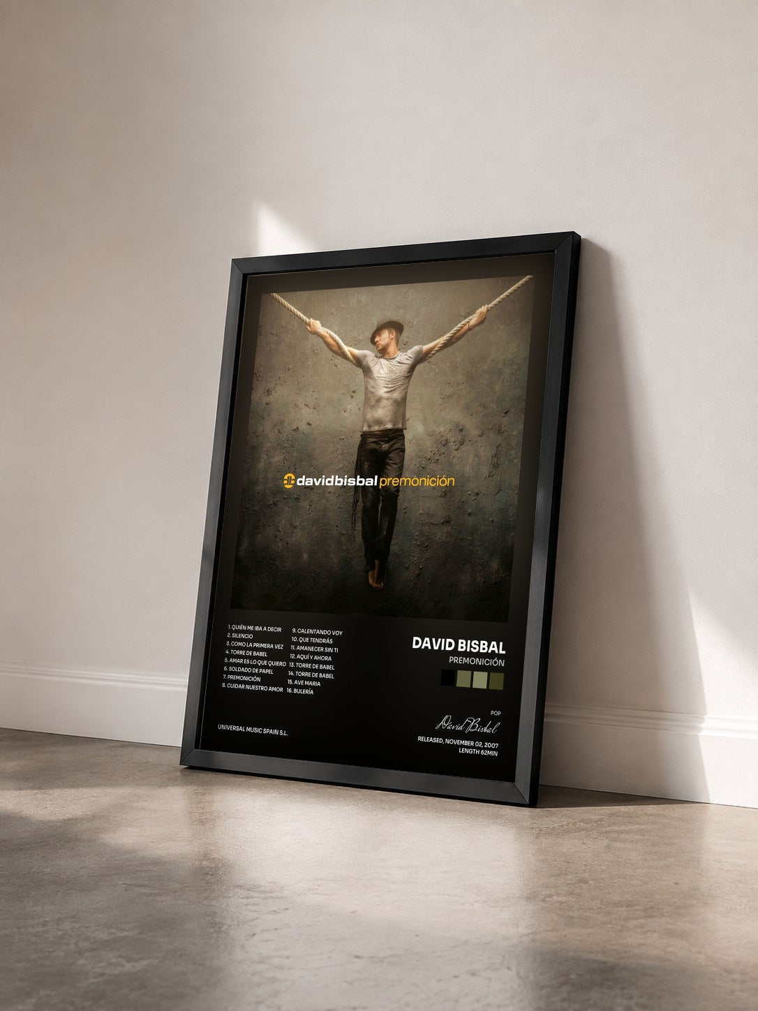 #noir Tableau de l'album Premonición de David Bisbal vu de trois quarts, cadre noir