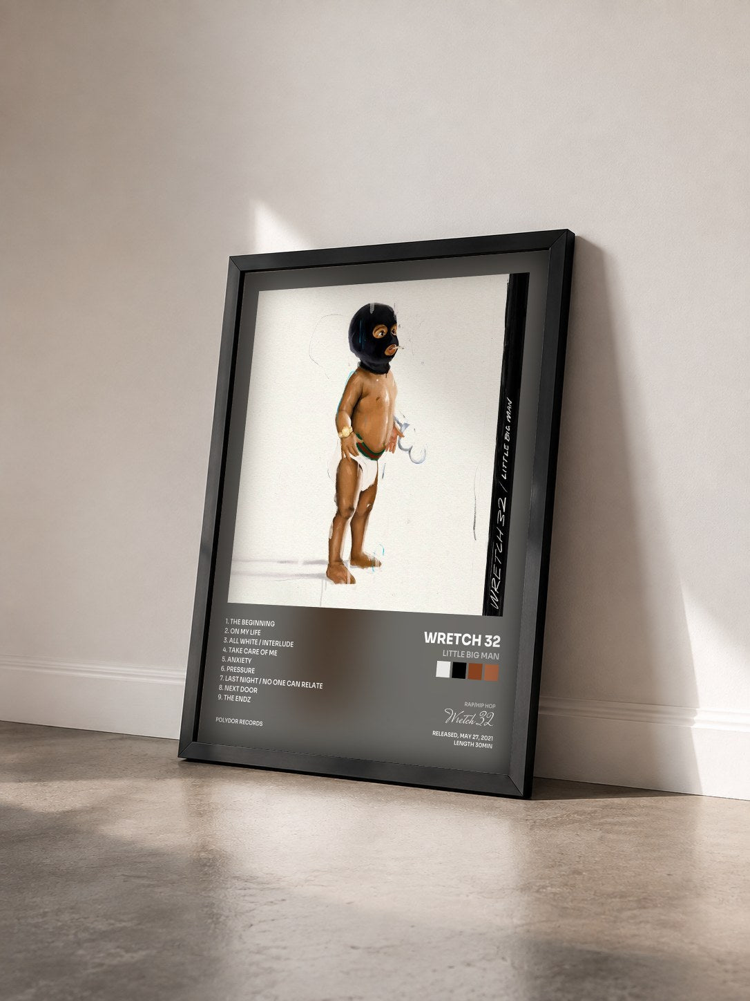 #noir Tableau de l'album little BIG Man de Wretch 32 vu de trois quarts, cadre noir