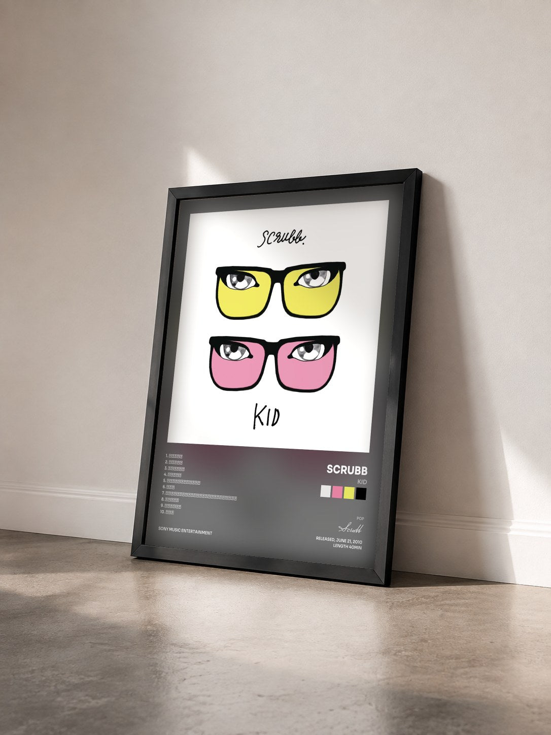 #noir Tableau de l'album KID de Scrubb vu de trois quarts, cadre noir