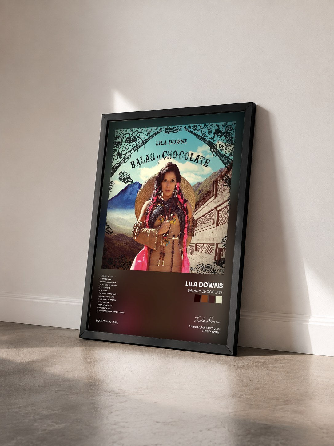 #noir Tableau de l'album Balas y Chocolate de Lila Downs vu de trois quarts, cadre noir