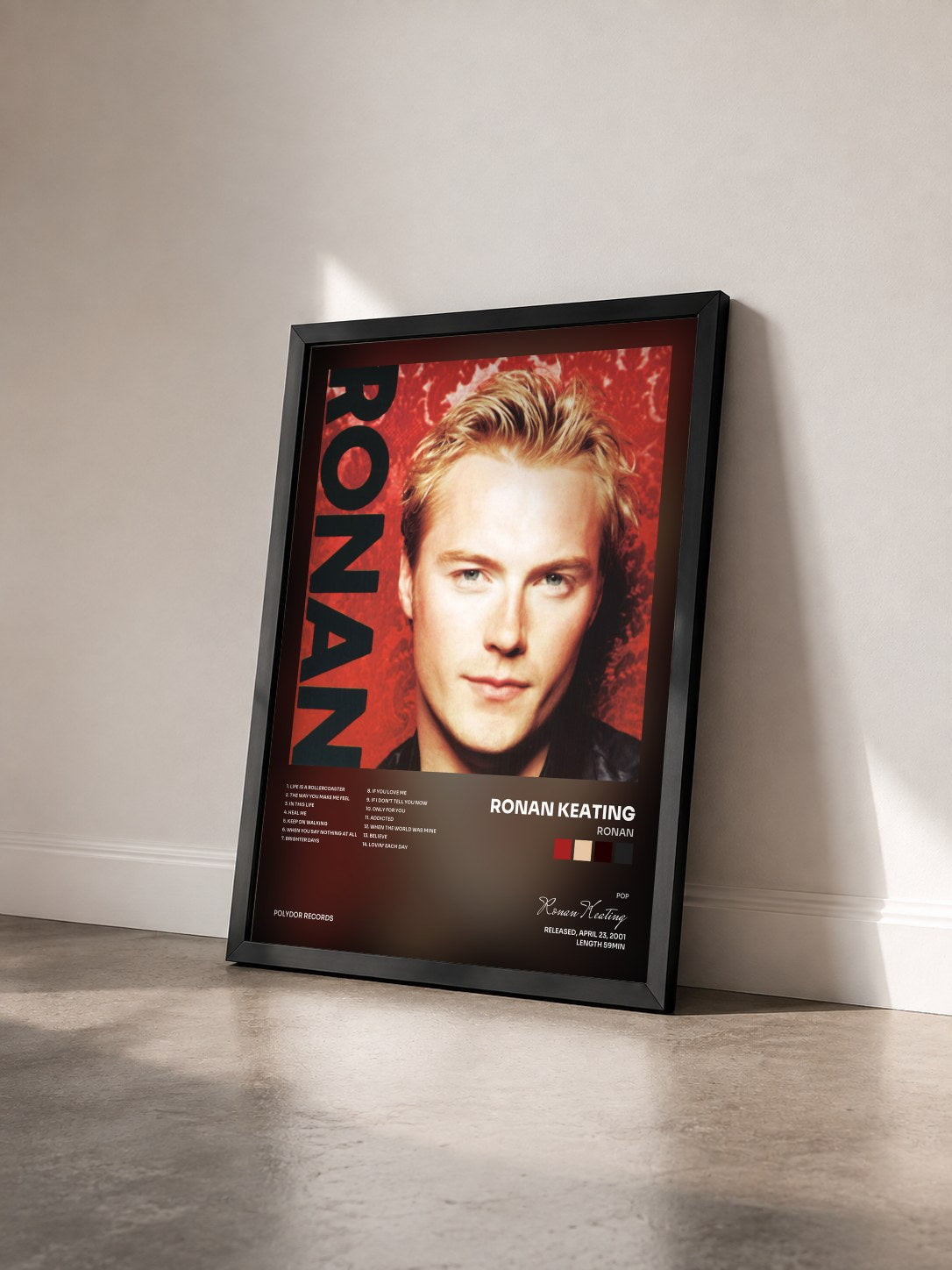 #noir Tableau de l'album Ronan de Ronan Keating vu de trois quarts, cadre noir