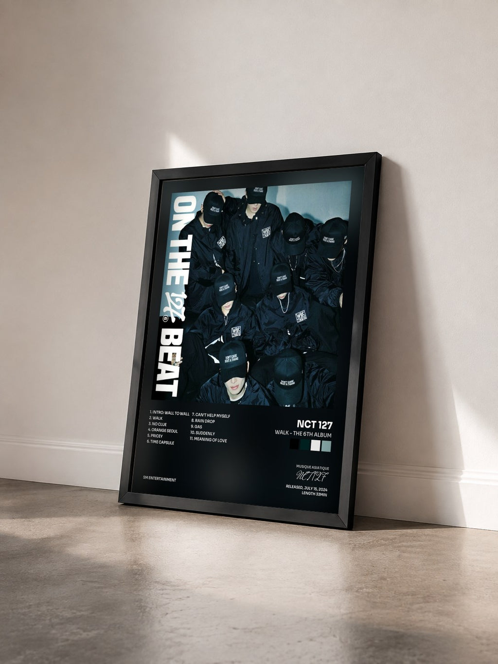 #noir Tableau de l'album WALK - The 6th Album de NCT 127 vu de trois quarts, cadre noir