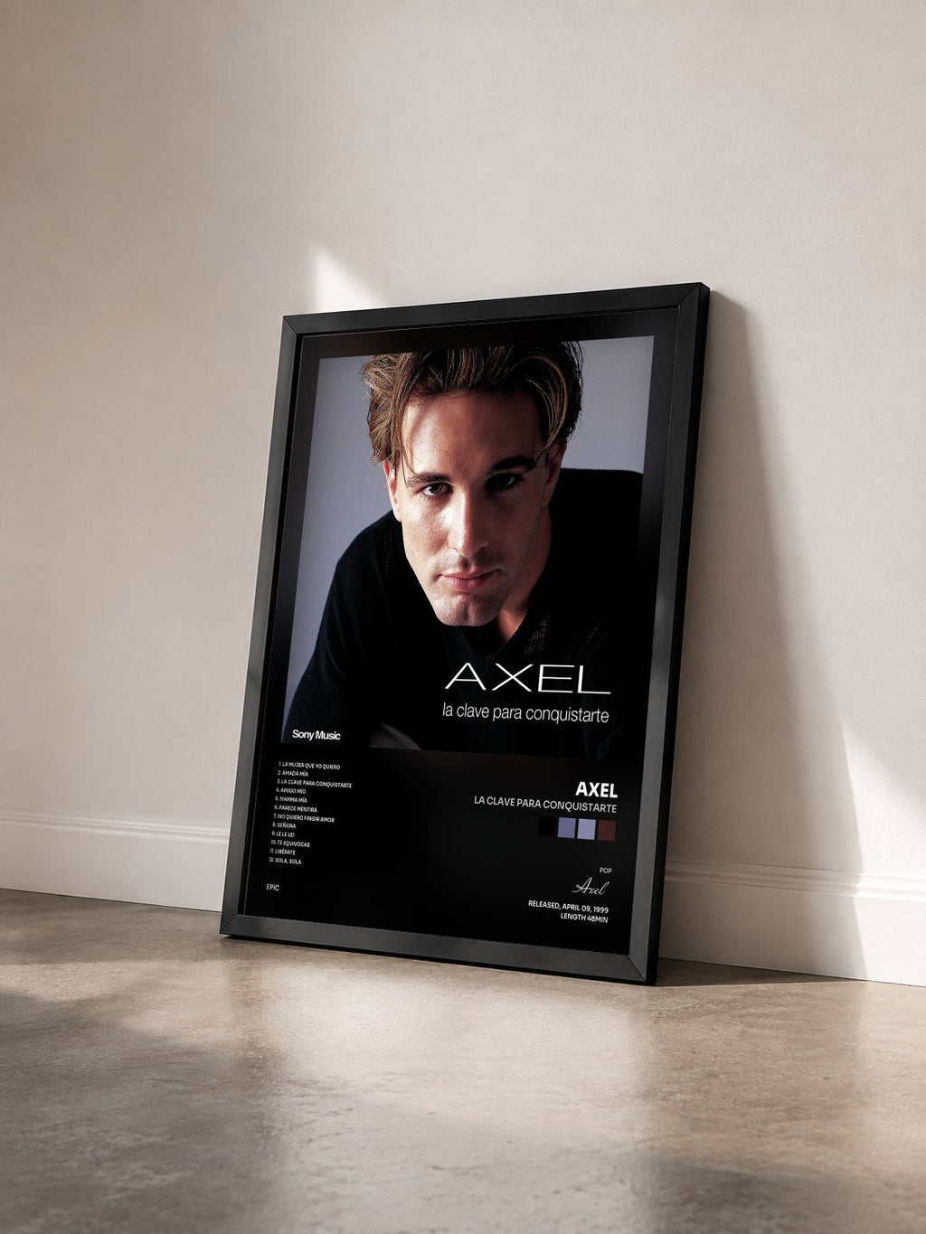 #noir Tableau de l'album La Clave para Conquistarte de Axel vu de trois quarts, cadre noir
