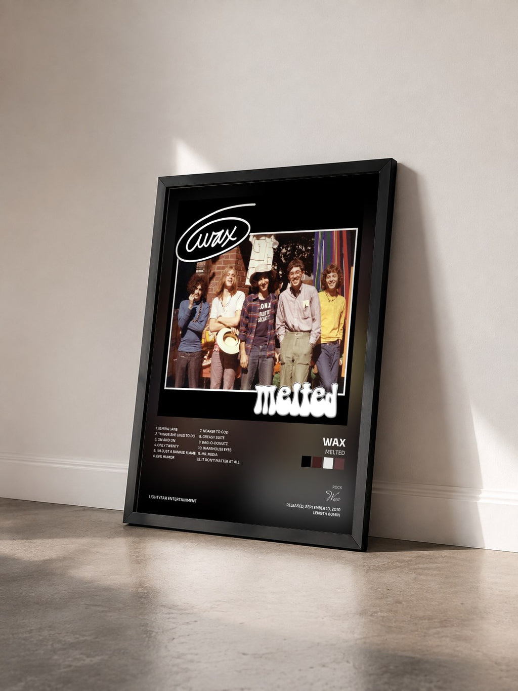 #noir Tableau de l'album Melted de Wax vu de trois quarts, cadre noir