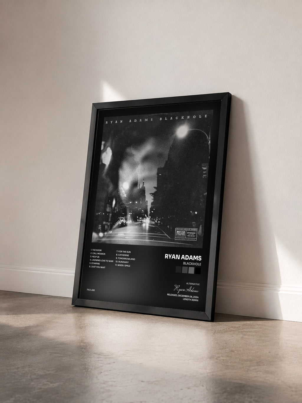#noir Tableau de l'album BLACKHOLE de Ryan Adams vu de trois quarts, cadre noir