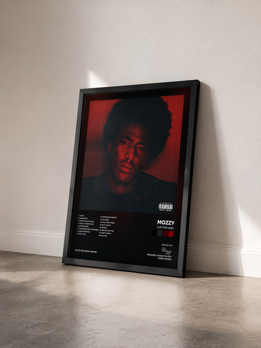 #noir Tableau de l'album 1 Up Top Ahk de Mozzy vu de trois quarts, cadre noir