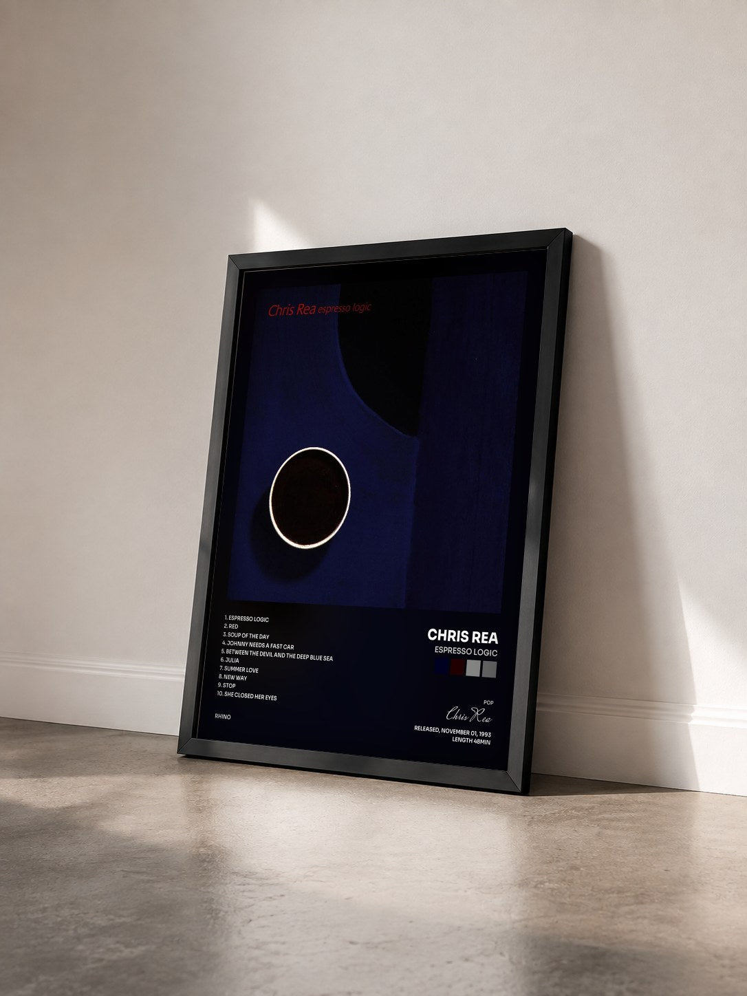 #noir Tableau de l'album Espresso Logic de Chris Rea vu de trois quarts, cadre noir