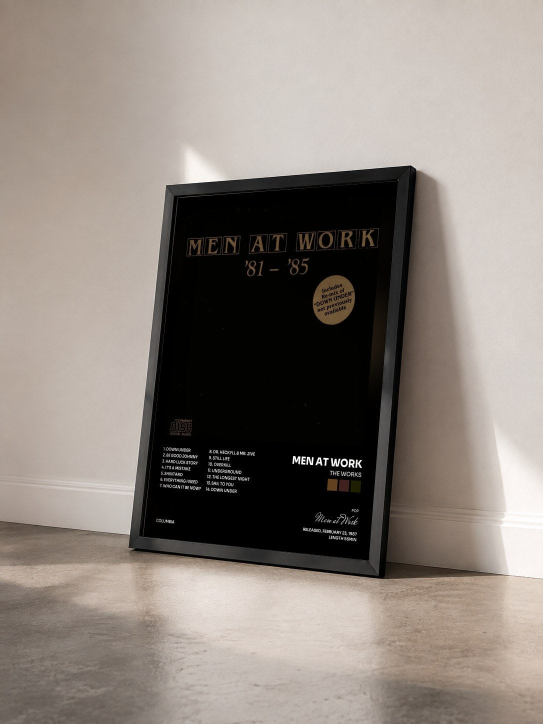 #noir Tableau de l'album The Works de Men at Work vu de trois quarts, cadre noir