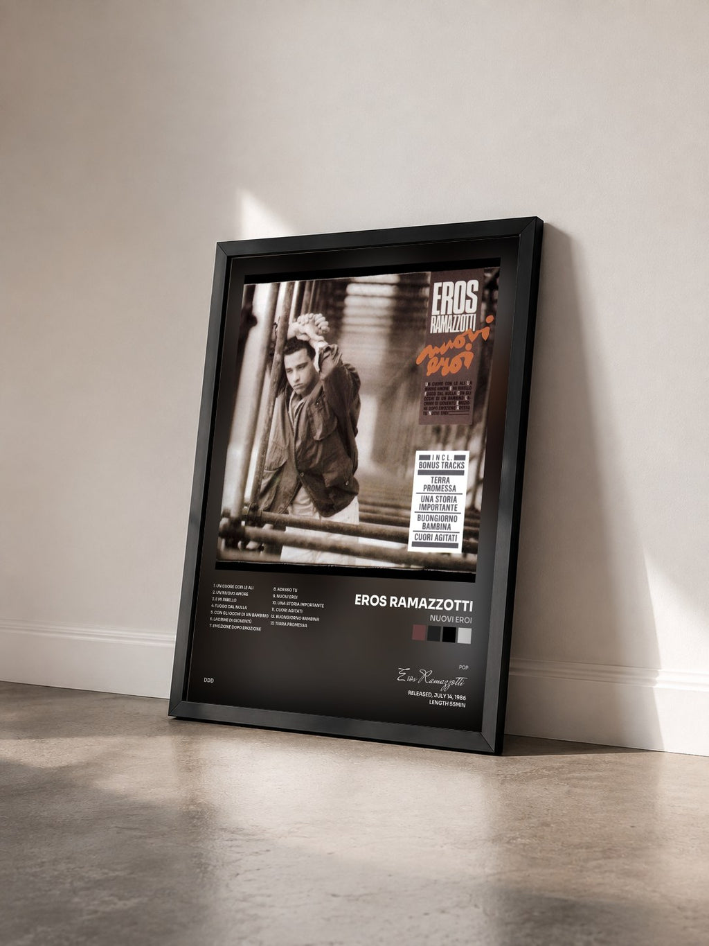 #noir Tableau de l'album Nuovi Eroi de Eros Ramazzotti vu de trois quarts, cadre noir