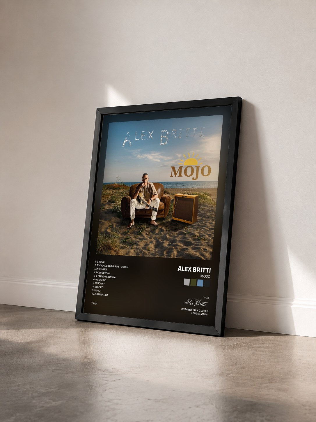 #noir Tableau de l'album Mojo de Alex Britti vu de trois quarts, cadre noir