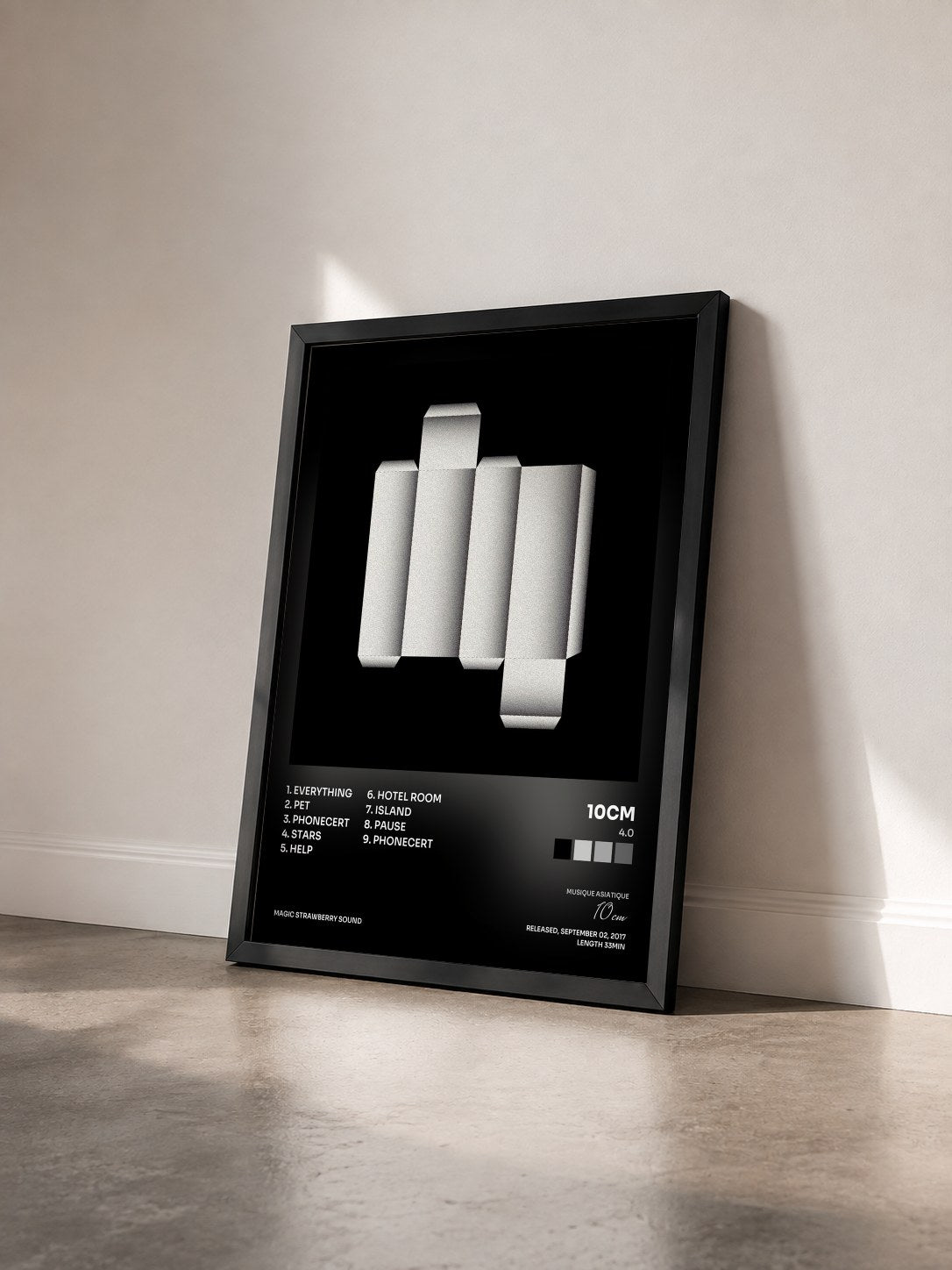 #noir Tableau de l'album 4.0 de 10cm vu de trois quarts, cadre noir