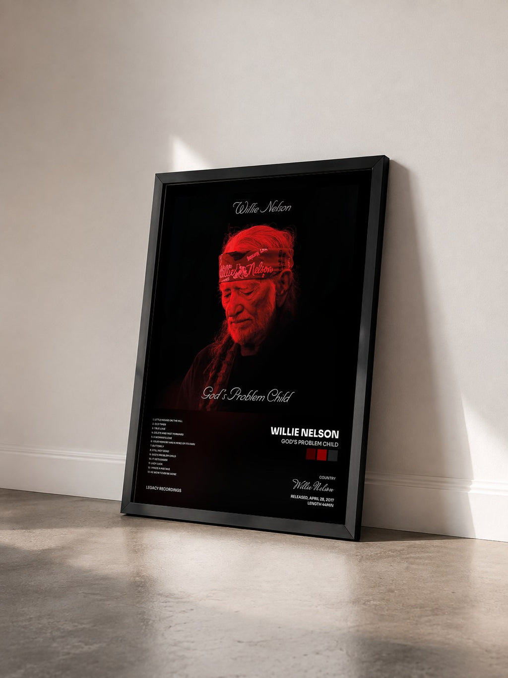 #noir Tableau de l'album God's Problem Child de Willie Nelson vu de trois quarts, cadre noir