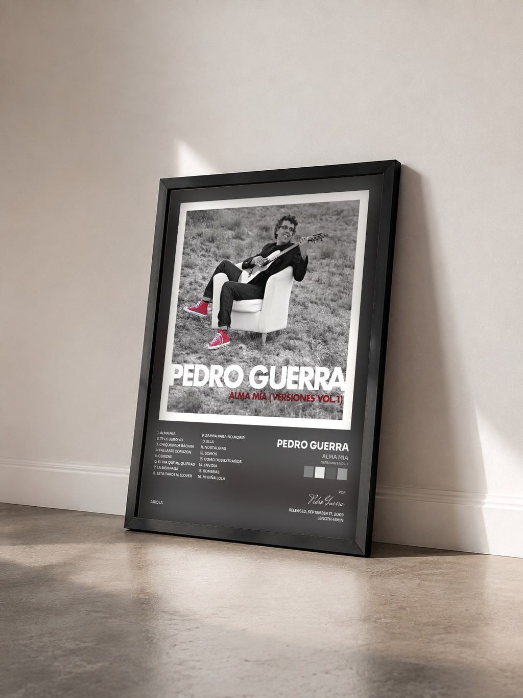 #noir Tableau de l'album Alma Mia (Versiones Vol. 1) de Pedro Guerra vu de trois quarts, cadre noir