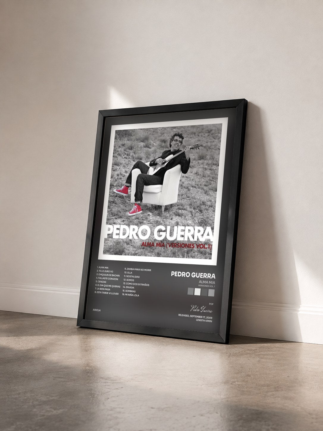 #noir Tableau de l'album Alma Mia (Versiones Vol. 1) de Pedro Guerra vu de trois quarts, cadre noir