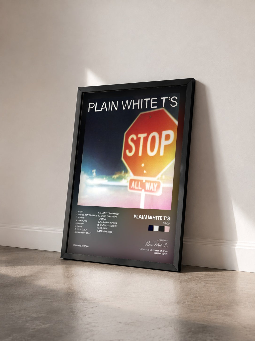 #noir Tableau de l'album Stop de Plain White T's vu de trois quarts, cadre noir