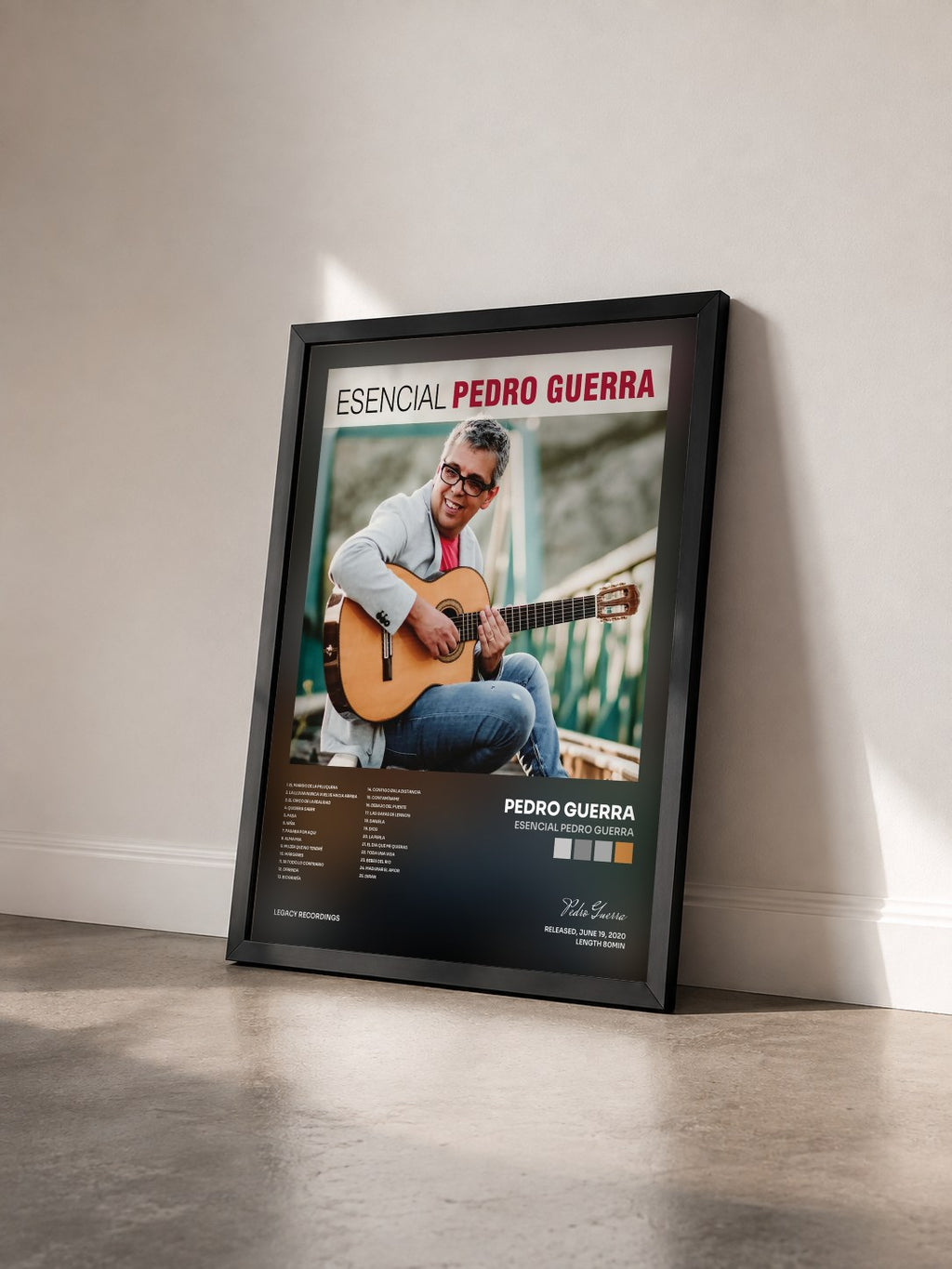 #noir Tableau de l'album Esencial Pedro Guerra de Pedro Guerra vu de trois quarts, cadre noir