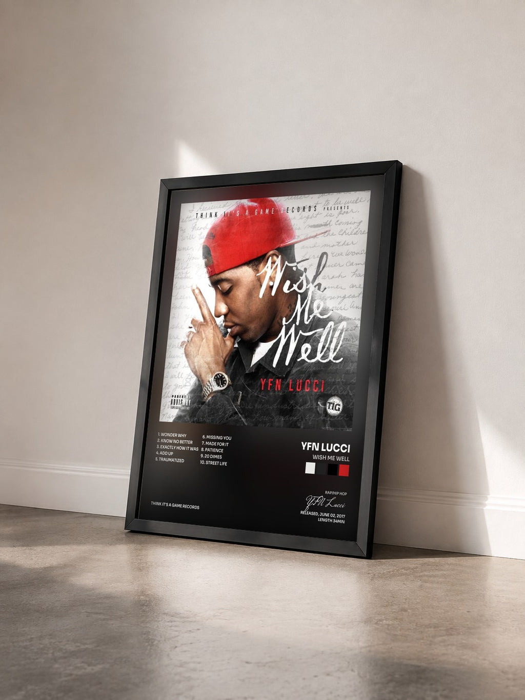 #noir Tableau de l'album Wish Me Well de YFN Lucci vu de trois quarts, cadre noir