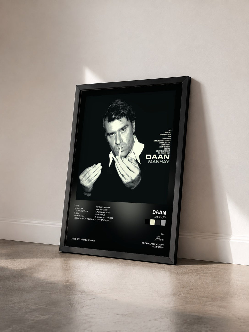 #noir Tableau de l'album Manhay de Daan vu de trois quarts, cadre noir