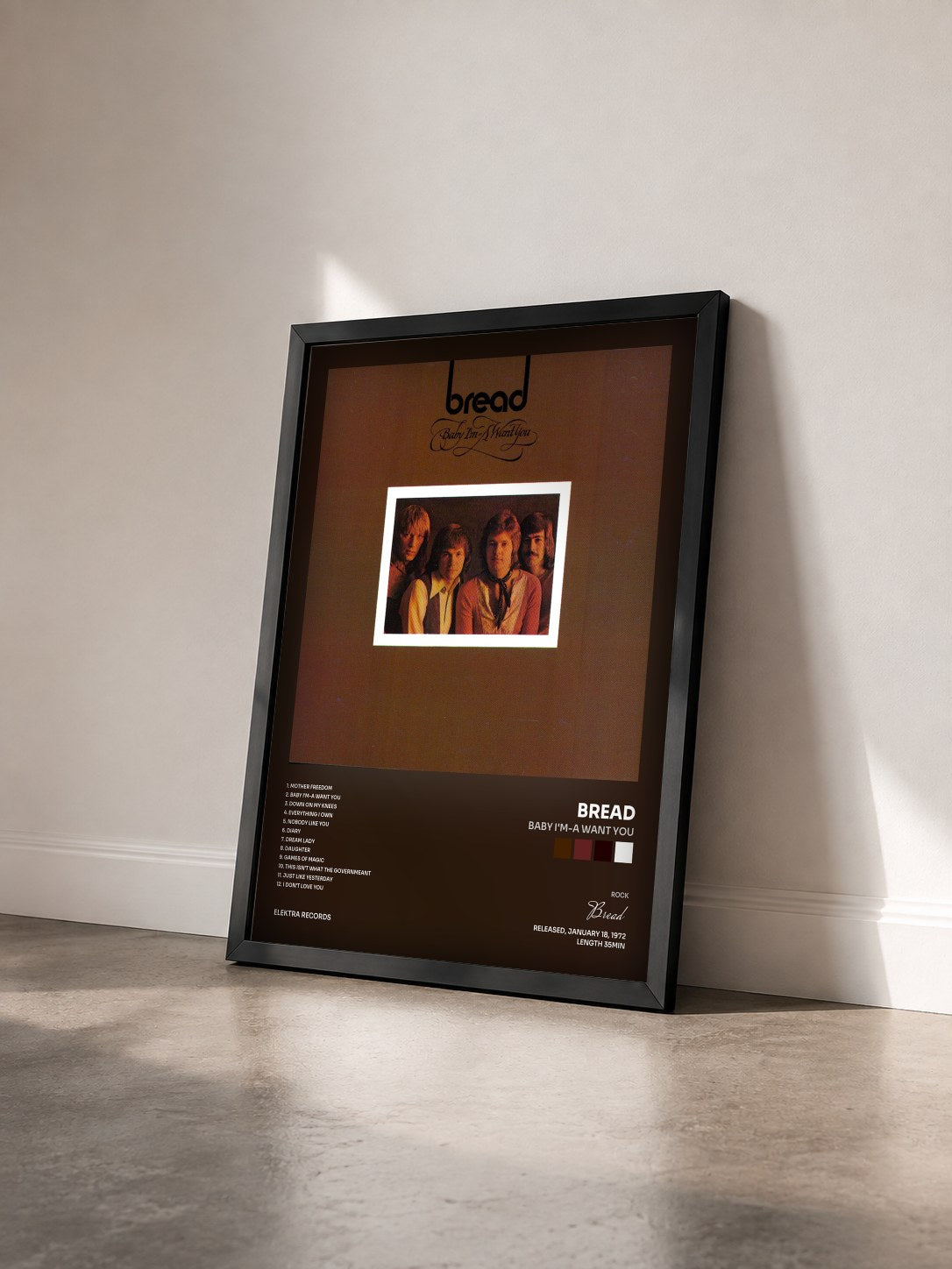 #noir Tableau de l'album Baby I'm-a Want You de Bread vu de trois quarts, cadre noir