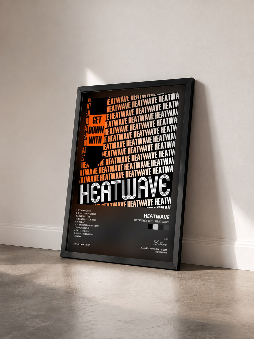 #noir Tableau de l'album Get Down with Heatwave de Heatwave vu de trois quarts, cadre noir