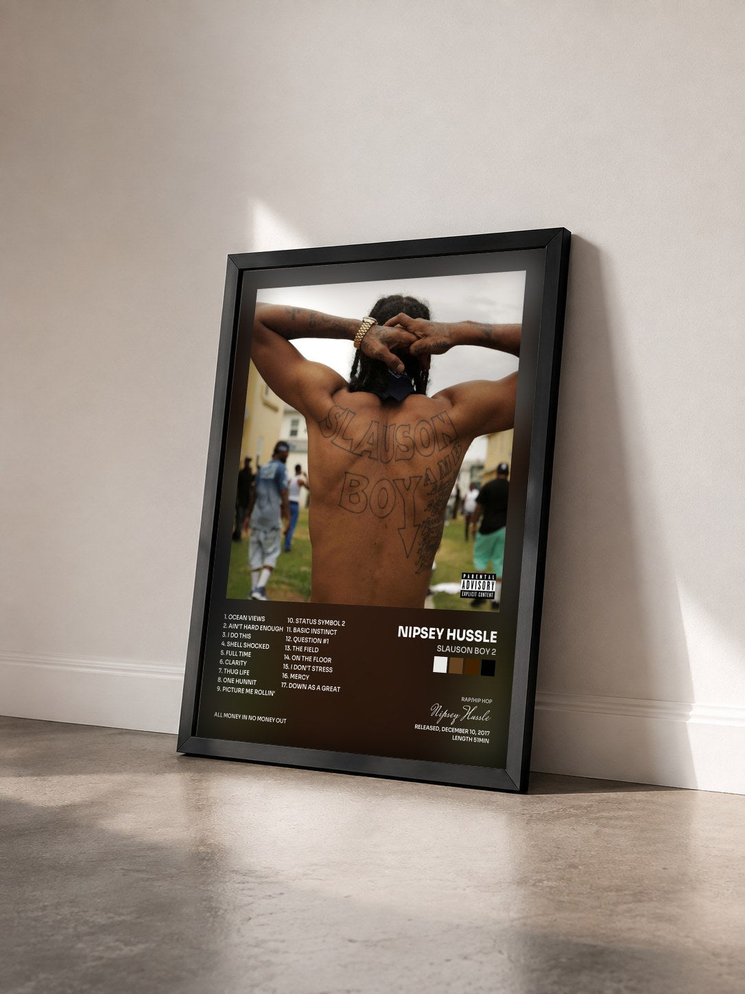 #noir Tableau de l'album Slauson Boy 2 de Nipsey Hussle vu de trois quarts, cadre noir