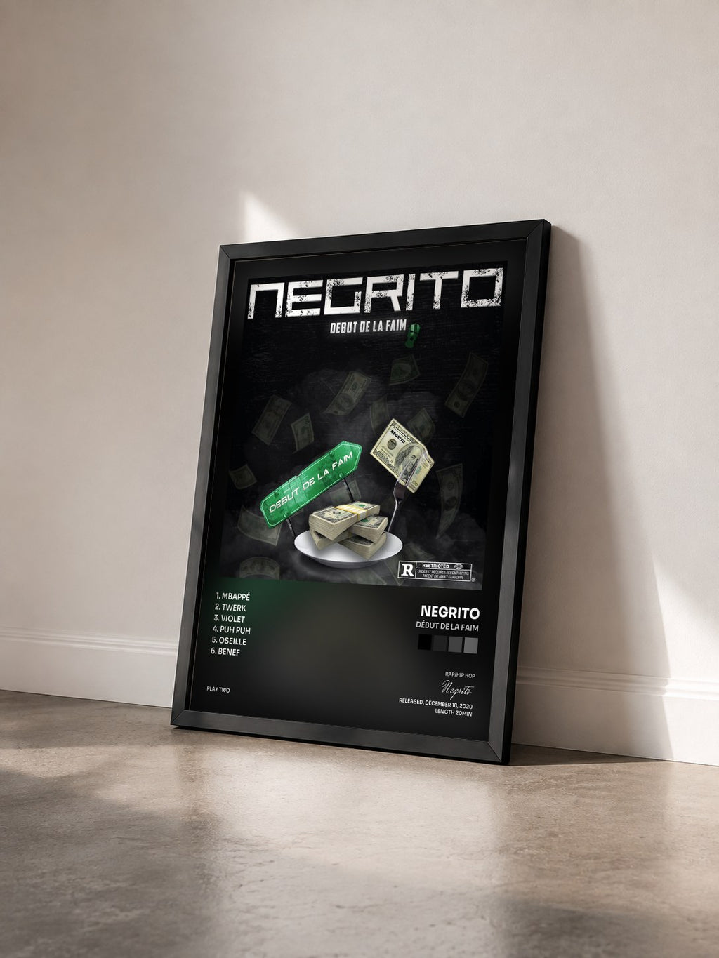 #noir Tableau de l'album Début de la faim de Negrito vu de trois quarts, cadre noir