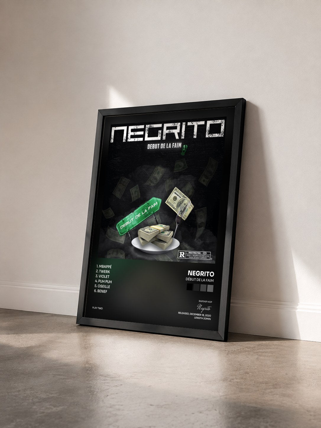 #noir Tableau de l'album Début de la faim de Negrito vu de trois quarts, cadre noir