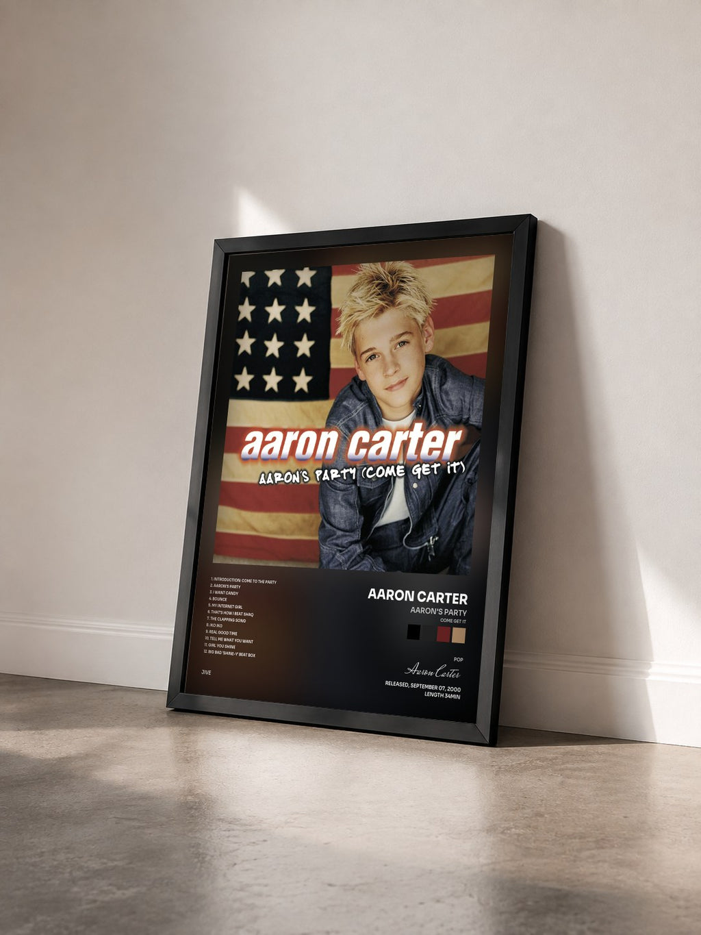#noir Tableau de l'album Aaron's Party (Come Get It) de Aaron Carter vu de trois quarts, cadre noir
