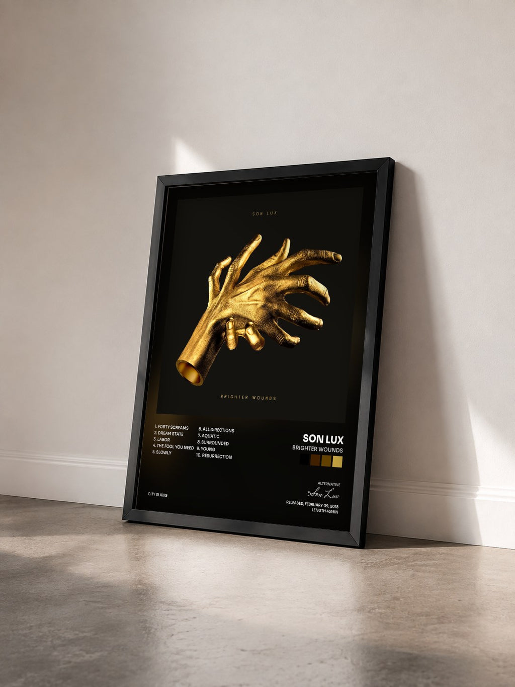 #noir Tableau de l'album Brighter Wounds de Son Lux vu de trois quarts, cadre noir