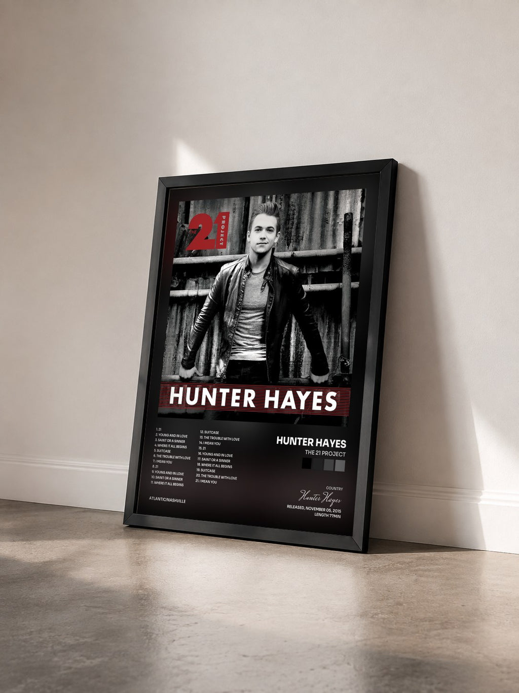 #noir Tableau de l'album The 21 Project de Hunter Hayes vu de trois quarts, cadre noir