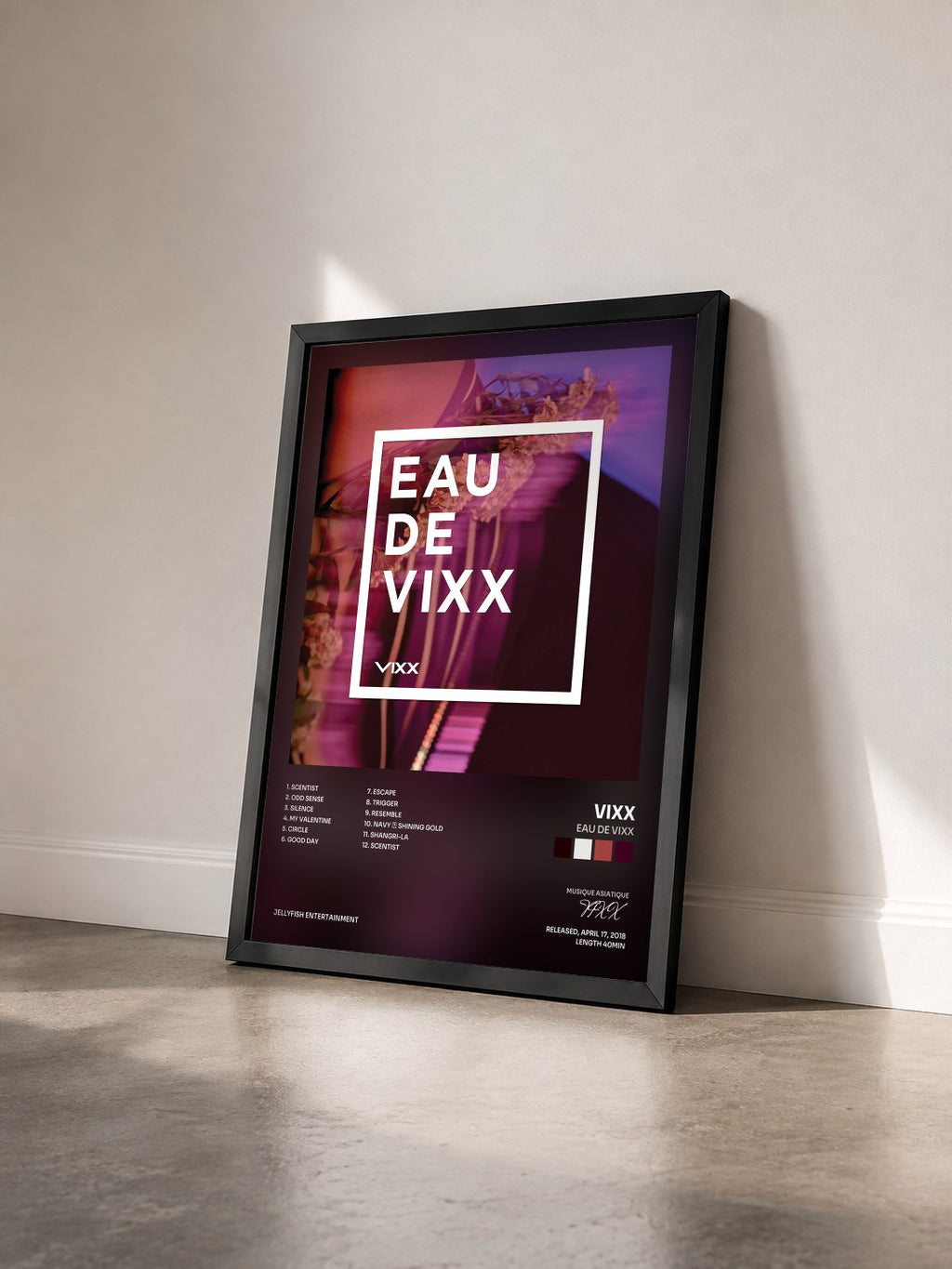 #noir Tableau de l'album EAU DE VIXX de VIXX vu de trois quarts, cadre noir